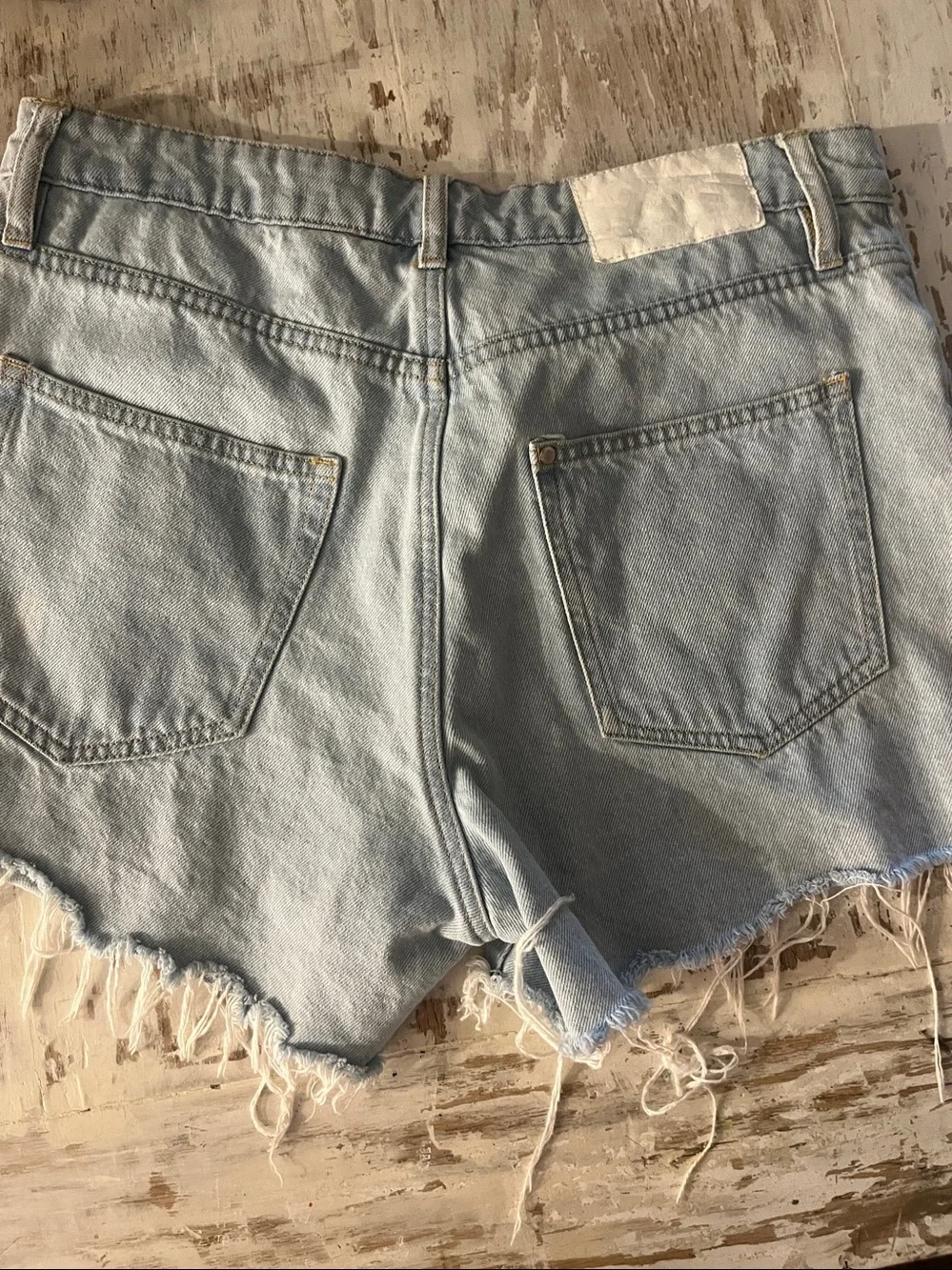 H&M light denim high rise shorts. Size 8